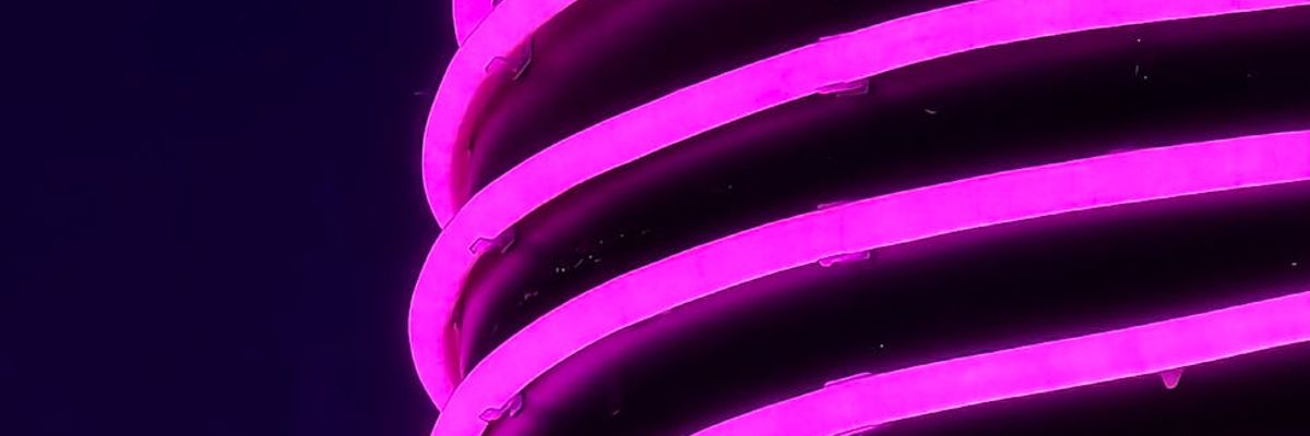 Wide abstract horizon with glowing violet light lines